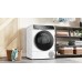 Bosch WQB246D1HK tumble dryer installed beside laundry shelves with the door closed
